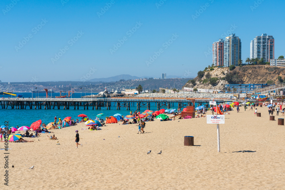 People sun bathing at Caleta Portales beach, Valparaiso, Valparaiso Province, Valparaiso Region, Chile People sun bathing at Caleta Portales beach, Valparaiso, Valparaiso Province, Valparaiso Region, Chile