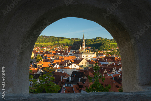 Historic town of Cesky Krumlov and Cesky Krumlov Caste Tower framed by opening, UNESCO World Heritage Site, Cesky Krumlov, South Bohemian Region