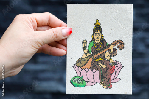 Saraswati, the Hindu goddess of knowledge, music, art, speech, wisdom, and learning, Vietnam photo