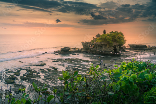View of Tanah Lot, traditional Balinese temple at sunset, Beraban, Kediri, Tabanan Regency, Bali