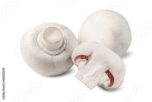 whole and half white button mushrooms isolated on white background.