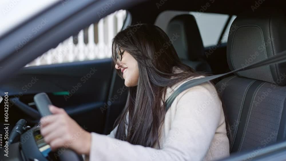 Young beautiful hispanic woman smiling confident holding key of new car at street Young beautiful hispanic woman smiling confident holding key of new car at street