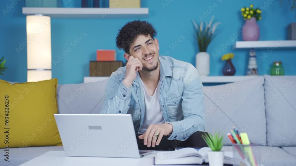 University student daydreaming while studying. University student daydreaming while studying.