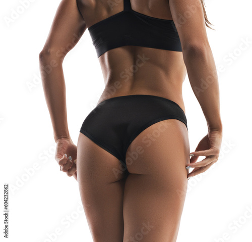 Muscular girl isolated cropped rearview