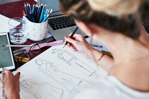 Woman, hands and fashion designer drawing sketch for planning, idea or project on office desk. Hand of creative female person, artist or graphic design sketching clothing ideas for startup on table photo