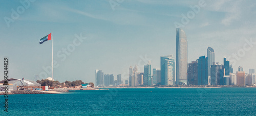 Sea view of Abu Dhabi downtown and skyscrapers. Sunny summer in UAE