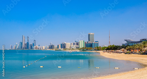 Obraz na płótnie View of Abu Dhabi with sea, beach and skyscrapers. Travel in UAE w salonie