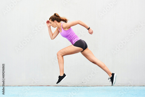 Woman, fitness and running on mockup for exercise, cardio training or healthy workout outdoors. Fit, active and sporty female person or runner exercising for health and wellness on mock up space