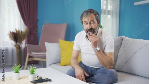 Sad middle-aged man.