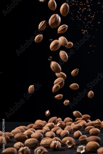 Closeup of nuts falling from a height, dynamic moment
