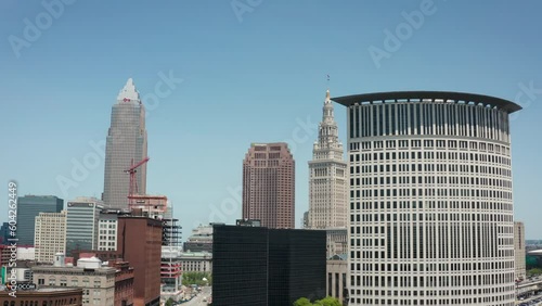 Cleveland Ohio downtown skyline 4K drone truck left low upwards shot