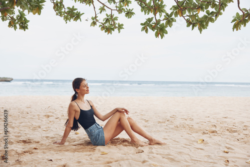 woman nature travel sand sea smile sitting vacation beach sexy freedom