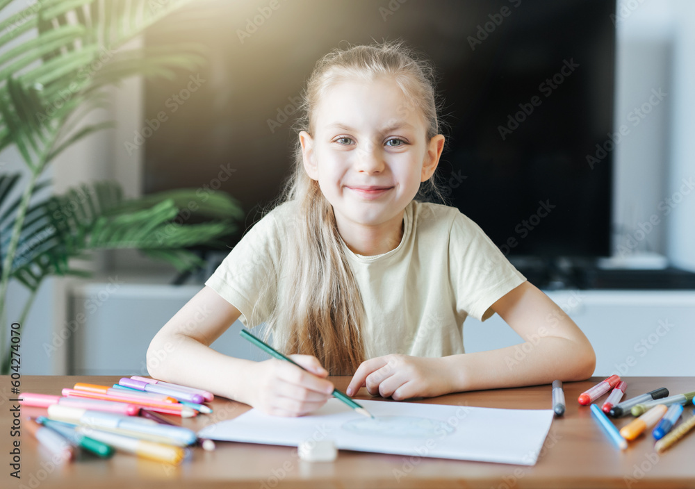 Child girl drawing with colorful pencils Child girl drawing with colorful pencils