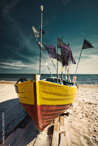 fishing boats on the beach © Grzegorz