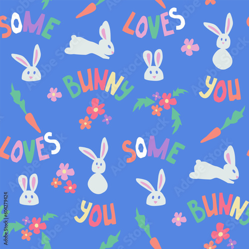 Childish papercraft seamless pattern with rabbits. Cutout text Some Bunny Loves You in pastel colors with flowers and carrots on blue background. Perfect for wallpaper, wrappinf, kids textile