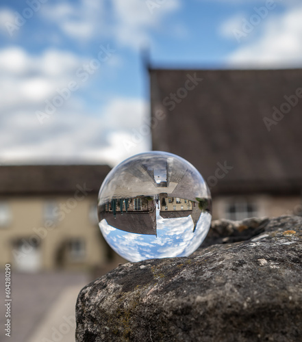 Fotografie Crystal lens refractory ball in city