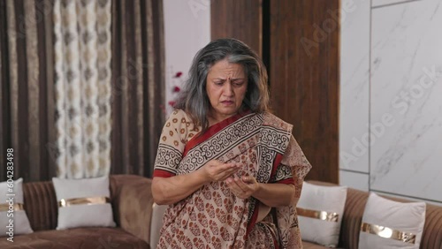 Old Indian woman suffering from hair loss
