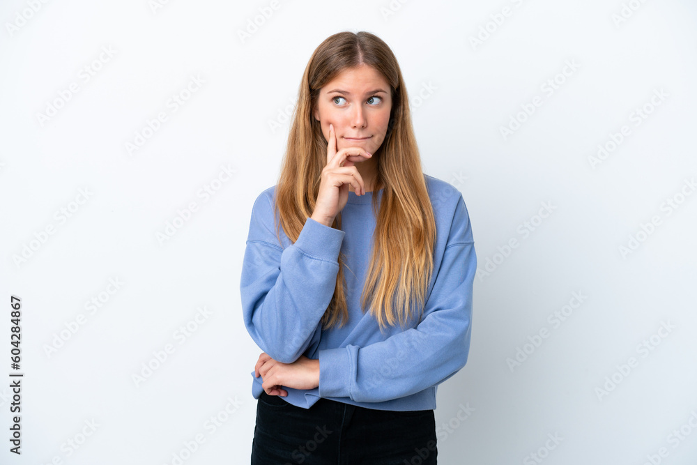Young blonde woman isolated on white background having doubts and thinking Young blonde woman isolated on white background having doubts and thinking