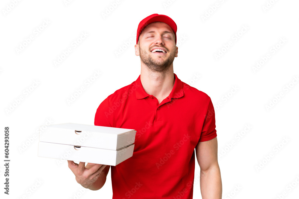 Pizza delivery man with work uniform picking up pizza boxes over isolated chroma key background laughing