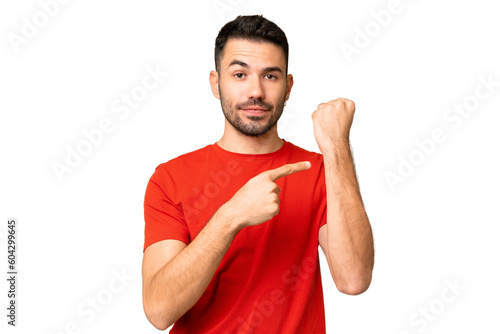 Young handsome caucasian man over isolated chroma key background making the gesture of being late