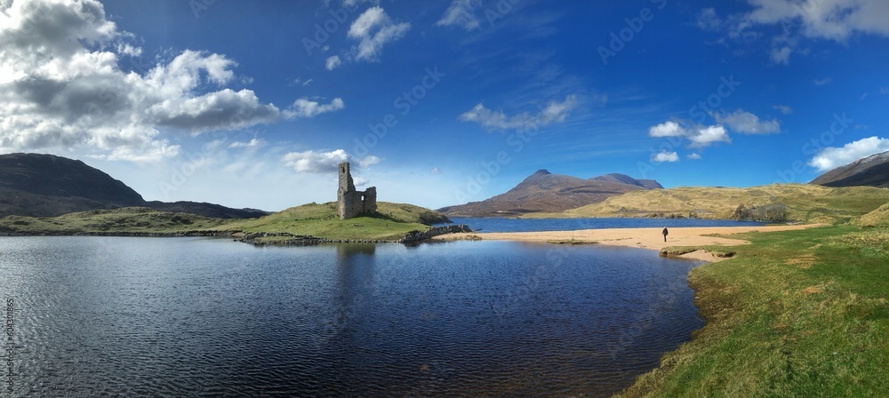 Ruin of castle at Loch Assynt. Lake. Panorama. Scotland