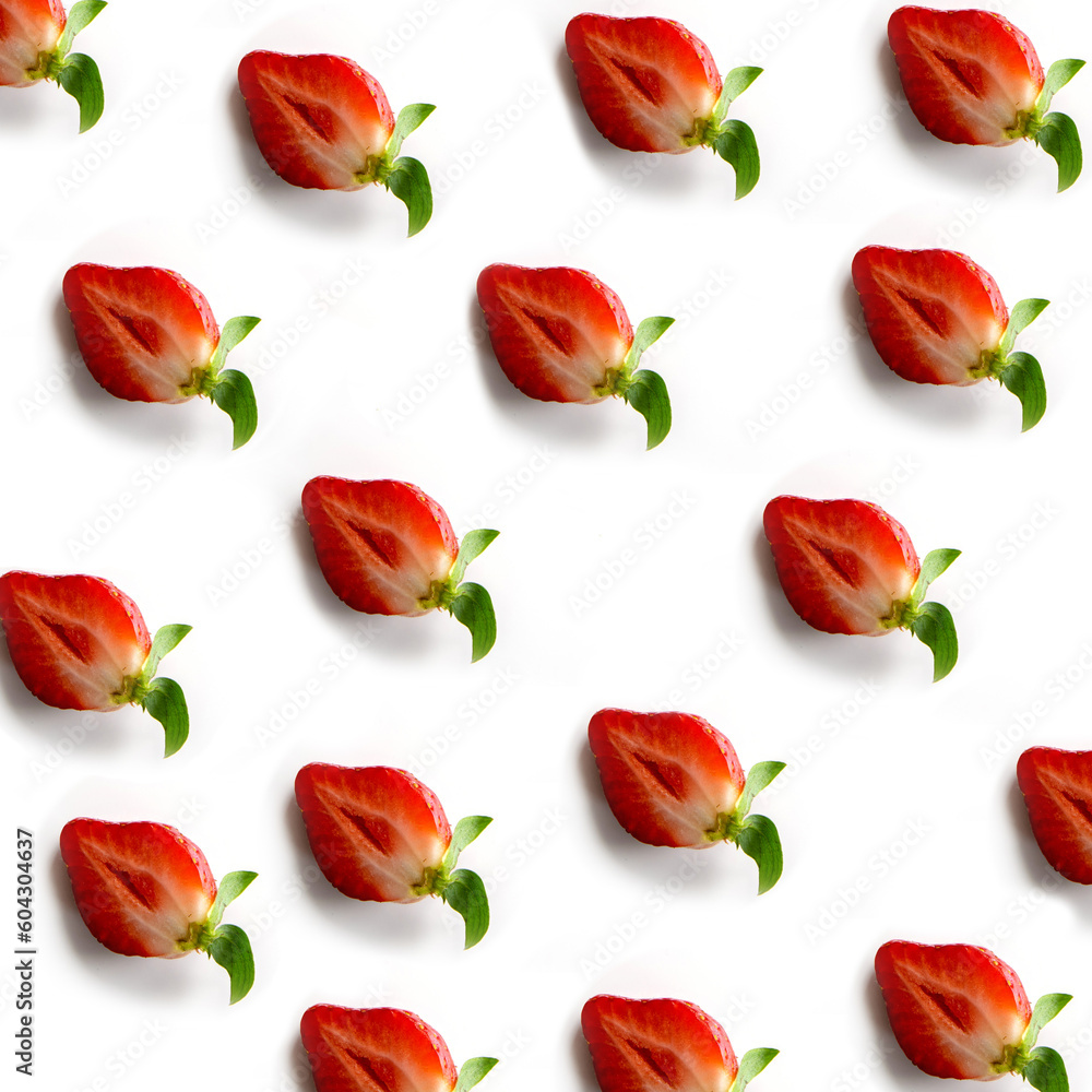 Strawberries on a white background Pattern from berries halves in random order. Composition in the style of flat lay. Natural product, view from above. Strawberries on a white background Pattern from berries halves in random order. Composition in the style of flat lay. Natural product, view from above.