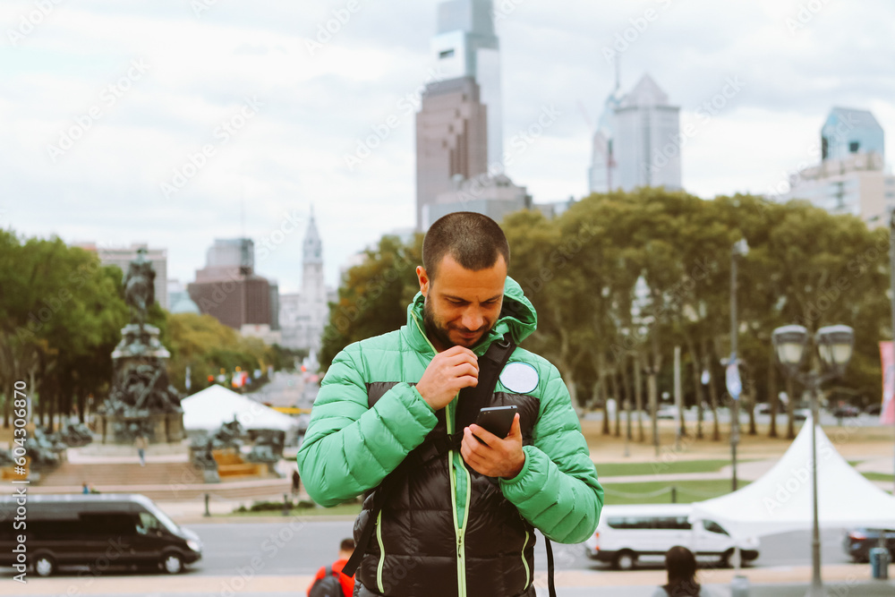 middle aged man using mobile phone outdoors middle aged man using mobile phone outdoors