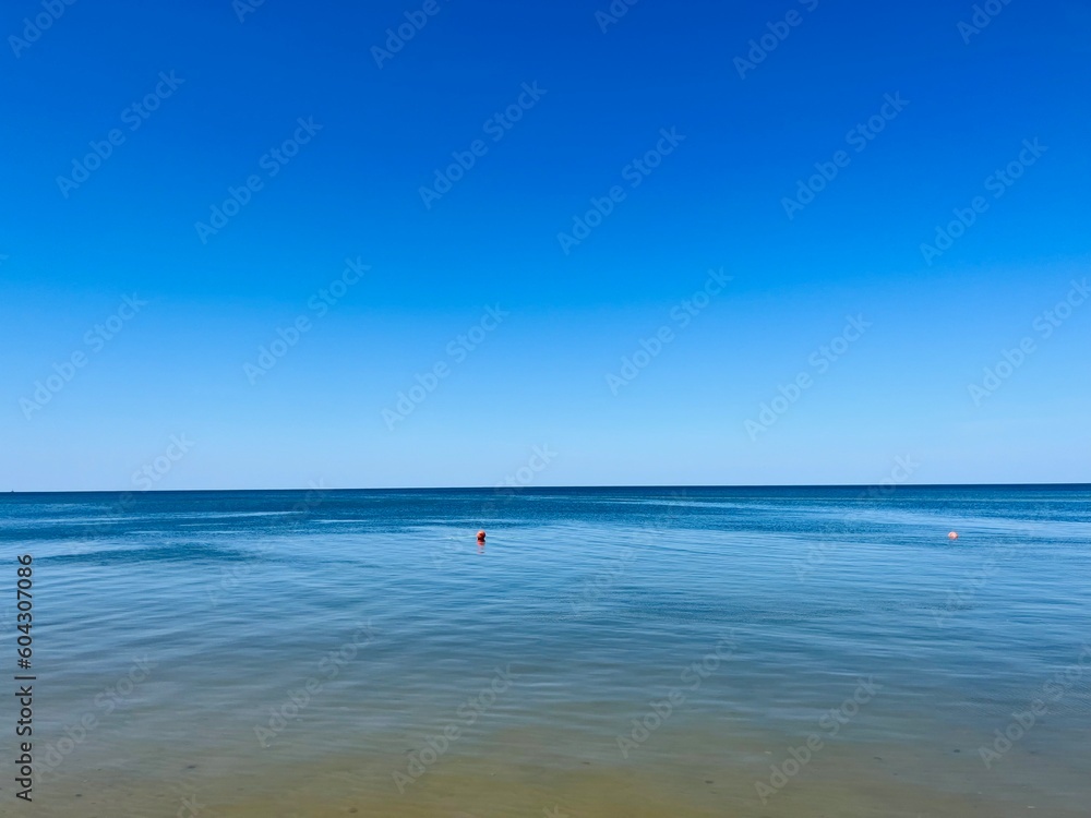 Blue sea horizon and blue sky