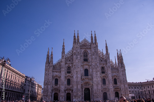Daytime view of famous Milan Cathedral (Duomo di Milano) on piazza in Milan, Italy
