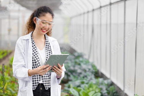 Happy Smiling Scientist Modern Farmer using Tablet Monitor Agriculture Farm Plant Research Working. Free Download Happy Smiling Scientist Modern Farmer using Tablet Monitor Agriculture Farm Plant Research Working. - GFXLoad