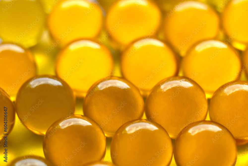 blurred background clear capsules filled with a dose of fish oil with omega-3 vitamin, very useful medicine, strong immunity, useful every day, lots of vitamin capsules,natural product,Fish Oil blurred background clear capsules filled with a dose of fish oil with omega-3 vitamin, very useful medicine, strong immunity, useful every day, lots of vitamin capsules,natural product,Fish Oil