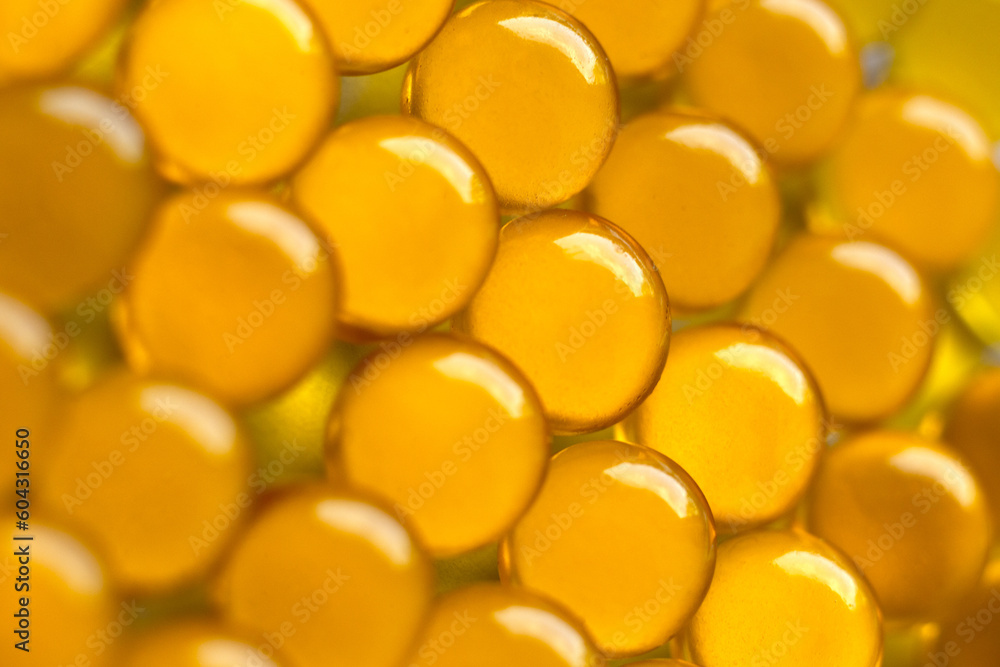 blurred background clear capsules filled with a dose of fish oil with omega-3 vitamin, very useful medicine, strong immunity, useful every day, lots of vitamin capsules,natural product,Fish Oil blurred background clear capsules filled with a dose of fish oil with omega-3 vitamin, very useful medicine, strong immunity, useful every day, lots of vitamin capsules,natural product,Fish Oil