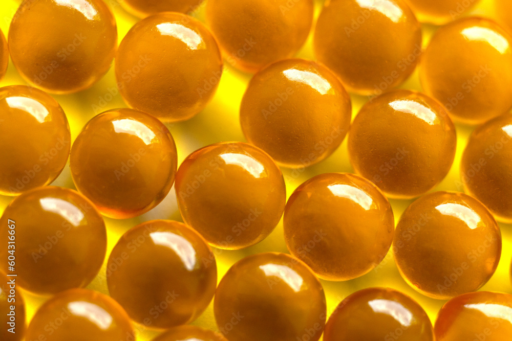 blurred background clear capsules filled with a dose of fish oil with omega-3 vitamin, very useful medicine, strong immunity, useful every day, lots of vitamin capsules,natural product,Fish Oil blurred background clear capsules filled with a dose of fish oil with omega-3 vitamin, very useful medicine, strong immunity, useful every day, lots of vitamin capsules,natural product,Fish Oil