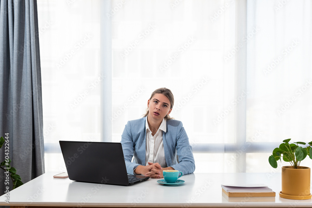 Thoughtful anxious business woman looking away thinking solving problem at work, worried serious young woman concerned make difficult decision lost in thought reflecting sit with laptop Thoughtful anxious business woman looking away thinking solving problem at work, worried serious young woman concerned make difficult decision lost in thought reflecting sit with laptop