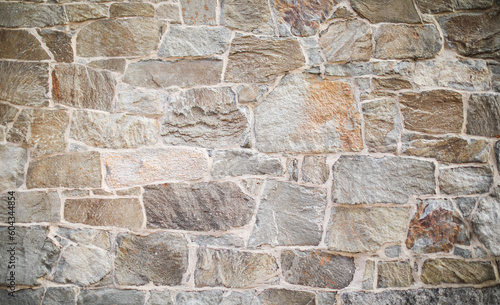 The rugged beauty of the stone wall texture reveals strength and history. A symbol of resilience, authenticity, and the passage of time etched in every crevice