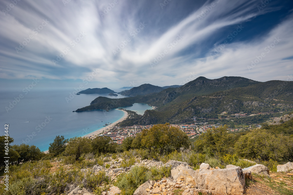 Сoastline with small bays, capes, beaches and town under cloudy sky, Lycian way start, Oludeniz, Turkey