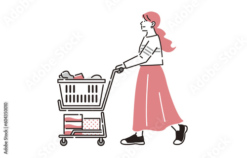  買い物カートを押す女性