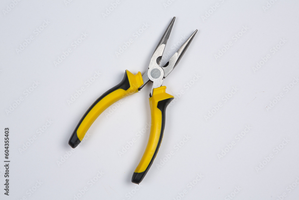 Set of tools for repair in a case on a white background. Assorted work or construction tools. Wrenches, Pliers, screwdriver. Top view Set of tools for repair in a case on a white background. Assorted work or construction tools. Wrenches, Pliers, screwdriver. Top view