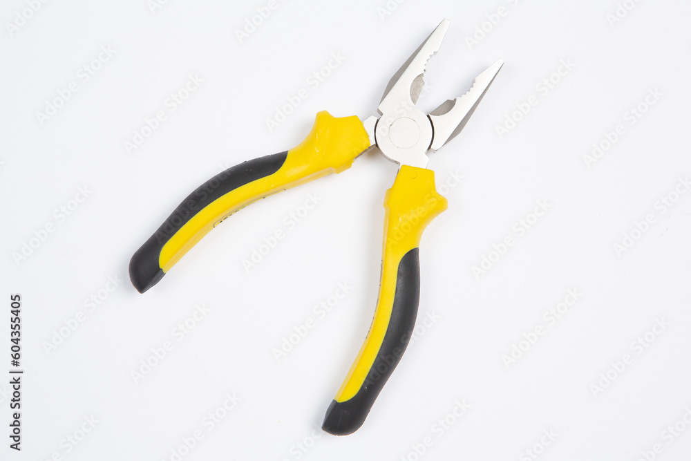 Fototapeta premium Set of tools for repair in a case on a white background. Assorted work or construction tools. Wrenches, Pliers, screwdriver. Top view