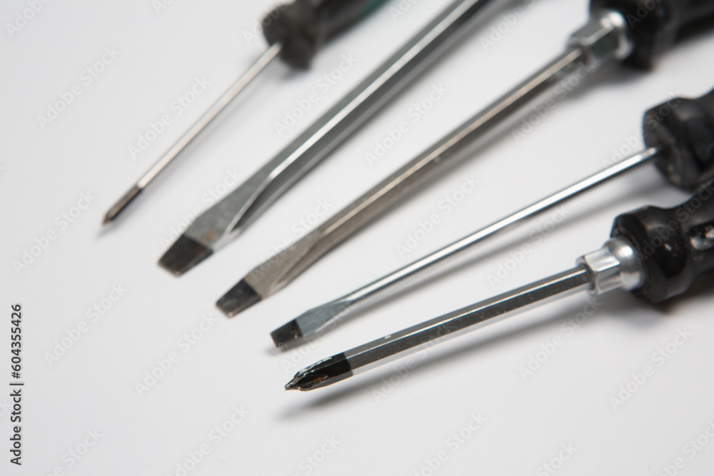 Set of tools for repair in a case on a white background. Assorted work or construction tools. Wrenches, Pliers, screwdriver. Top view Set of tools for repair in a case on a white background. Assorted work or construction tools. Wrenches, Pliers, screwdriver. Top view