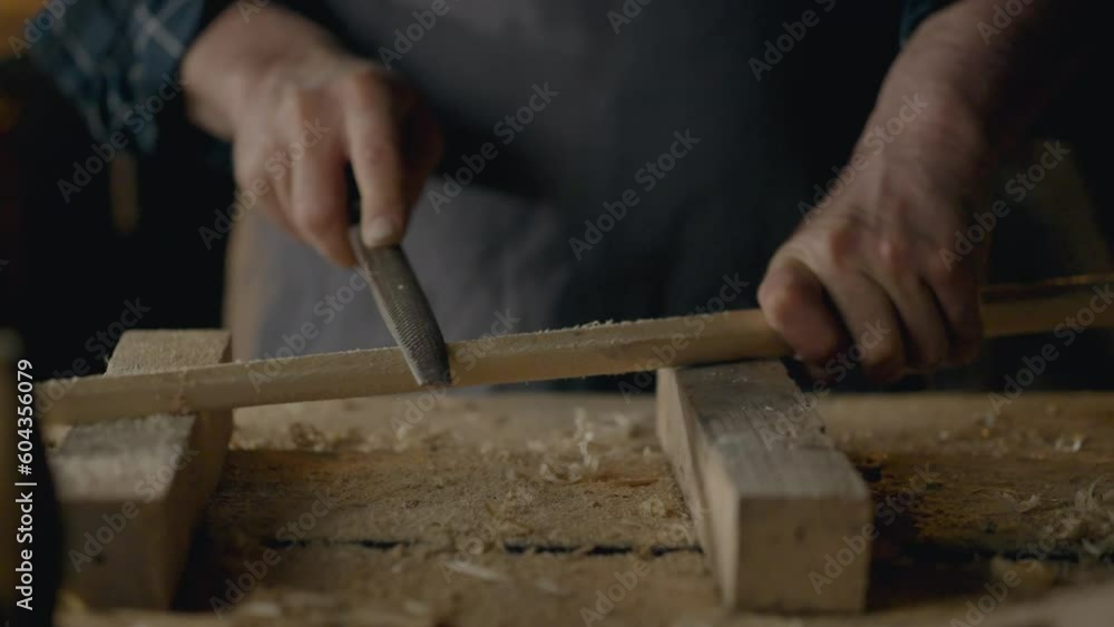 Hands, Workshop Worker Slowly Uses Hand Tool Rasp In Carpentry Workshop Close-up Woodworking Technician Works With Solid Wood At Work Table In Carpentry Workshop, detail
Hands, Workshop Worker Slowly Uses Hand Tool Rasp In Carpentry Workshop Close-up Woodworking Technician Works With Solid Wood At Work Table In Carpentry Workshop, detail