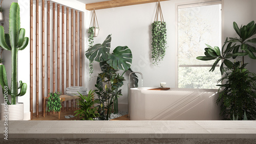 Wooden vintage table top or shelf closeup  zen mood  over sustainable minimal white bathroom with bathtub and many houseplants  architecture interior design  urban jungle