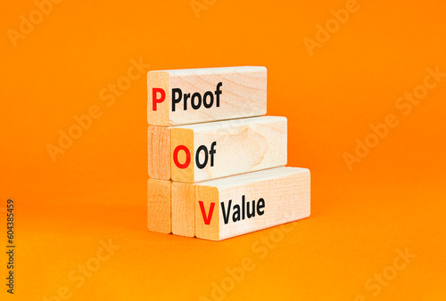 POV Proof of value symbol. Concept words POV Proof of value on beautiful wooden block. Beautiful orange table orange background. Business and POV Proof of value concept. Copy space.