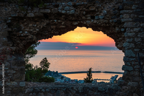 Beautiful sunset view from the historical castle of Kyparissia coastal town at sunset. Located in northwestern Messenia, Peloponnese, Greece, Europe. photo