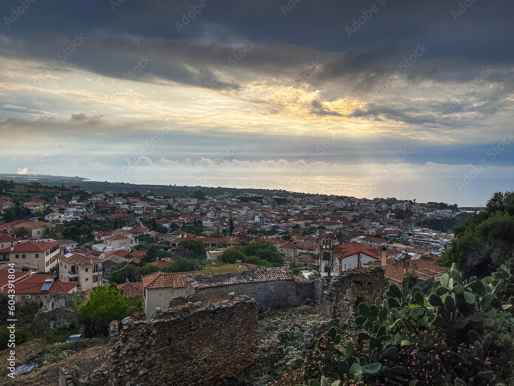Beautiful sunset view by the historical castle of Kyparissia coastal town at sunset. Located in northwestern Messenia, Peloponnese, Greece, Europe.
