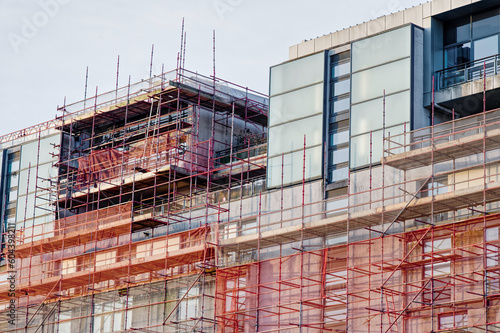 Obraz na płótnie High rise residential building of flats with cladding being replaced with fire r