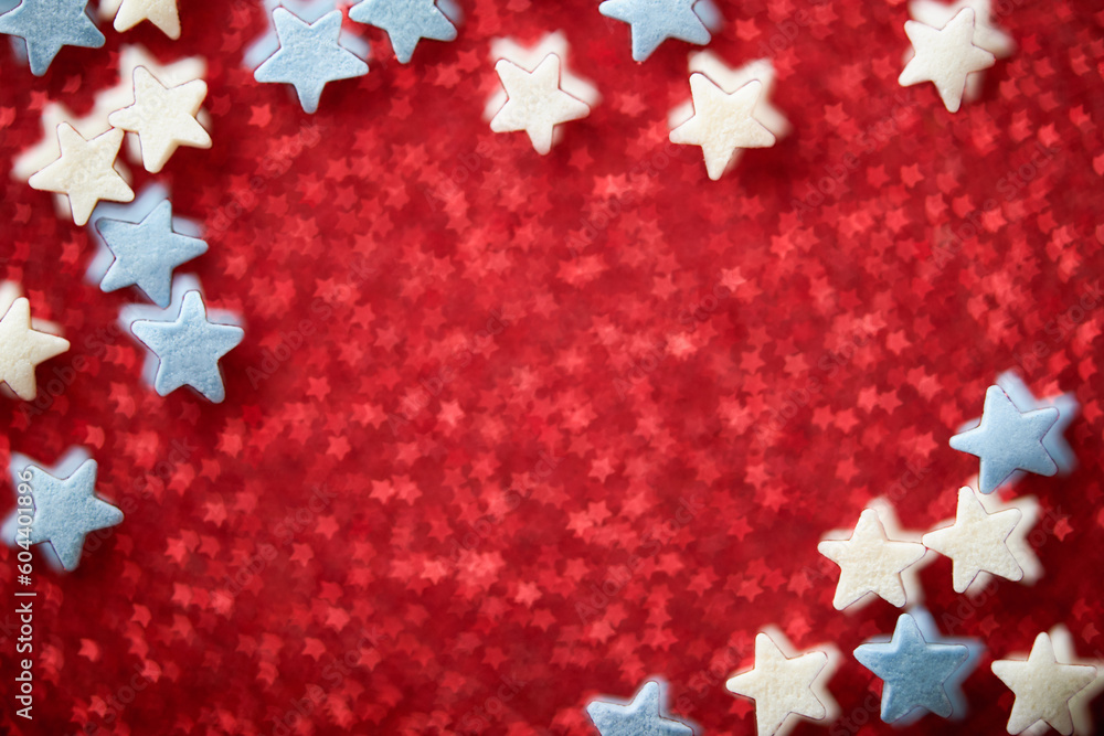 4th of July. USA Patriotic flag from blurred view of glitters and stars. Memorial, President, Labor Day background. Mock up. Patriotic day card. Bokeh background with firework and copy space. 4th of July. USA Patriotic flag from blurred view of glitters and stars. Memorial, President, Labor Day background. Mock up. Patriotic day card. Bokeh background with firework and copy space.