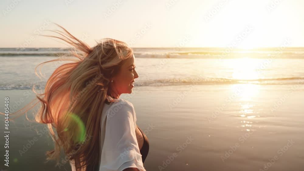 Attractive blond woman at the beach at sunset in Southern California. Slow Motion. Attractive blond woman at the beach at sunset in Southern California. Slow Motion.
