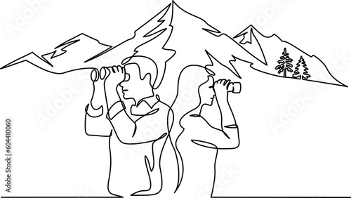 Man and woman looking into distance with binoculars over mountains