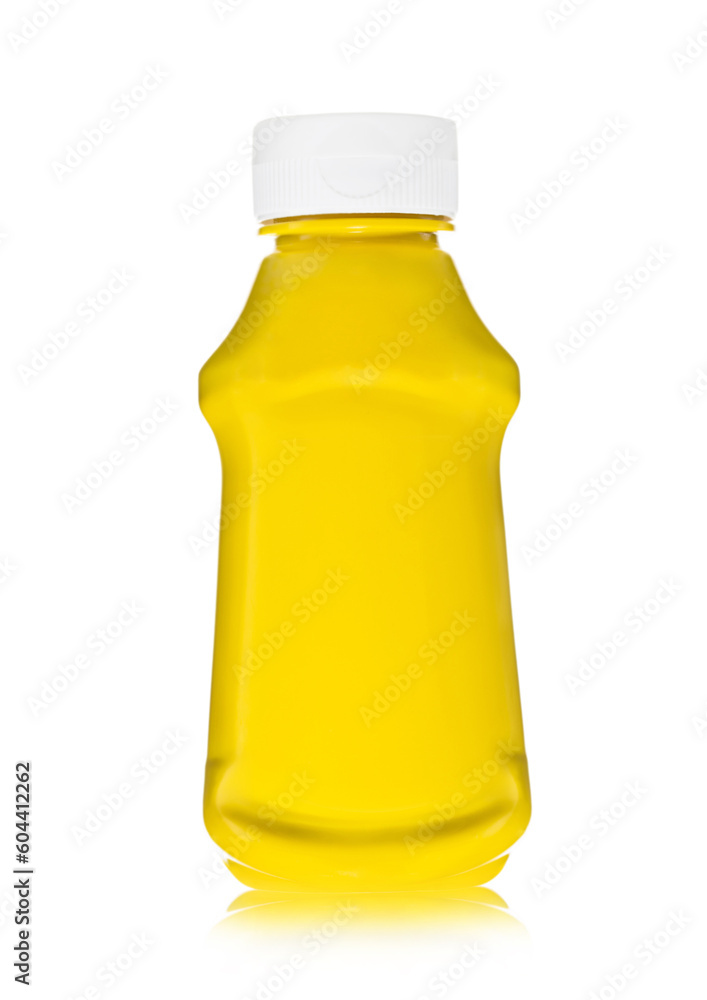 Bottle of classic yellow honey mustard sauce dip on white background. Bottle of classic yellow honey mustard sauce dip on white background.